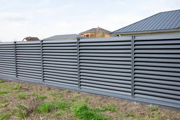 Modern metal profile fence with shutters or blinds