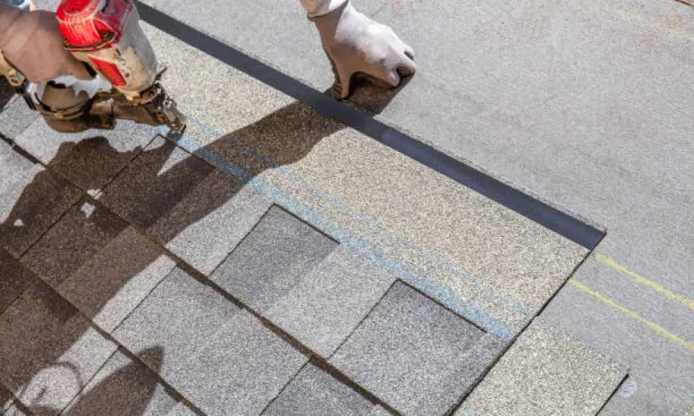 Installing new roof with air gun