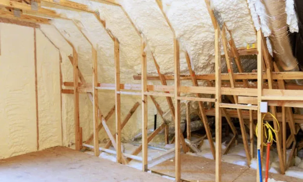 New home under construction with spray foam thermal hydro insulation on walls